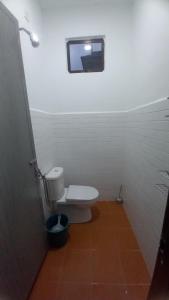 Koupelna v ubytování Ujang's Homestay + 5 fotografií