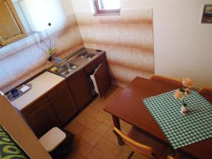 Kuchyň nebo kuchyňský kout v ubytování Nar Apartment