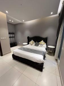 Postel nebo postele na pokoji v ubytování شاليهات اوليفيا