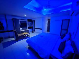 Letto o letti in una camera di Hotel Paradise