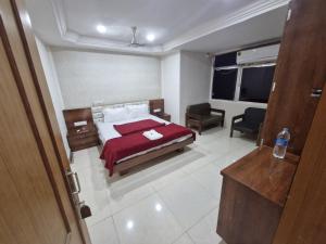 Letto o letti in una camera di Hotel Paradise