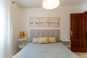 Postel nebo postele na pokoji v ubytování Bonito Apartamento en Primera Línea de Playa