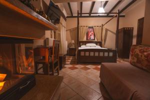 Postel nebo postele na pokoji v ubytování Kallinikos Guesthouse