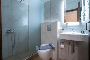 Koupelna v ubytování Kallinikos Guesthouse