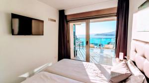 Postel nebo postele na pokoji v ubytování Skyline Floor 28 Sea Views + 37 fotografií