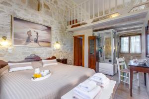 Posteľ alebo postele v izbe v ubytovaní Villa Vincenzos by Villa Plus