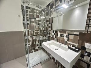 Koupelna v ubytování Arkè Rooms