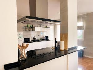 Nhà bếp/bếp nhỏ tại BENAMAR HOUSE
