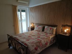 A bed or beds in a room at City Break Nomentana