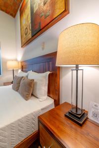 Postel nebo postele na pokoji v ubytování Hotel NG