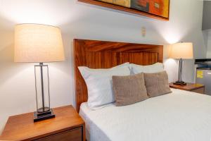 Postel nebo postele na pokoji v ubytování Hotel NG