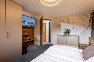 Postel nebo postele na pokoji v ubytování Haus Michael