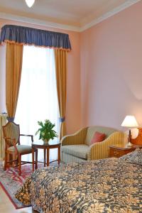 Hotel Kolonada客房内的一张或多张床位