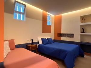 Una cama o camas en una habitación de Bragança Apartments