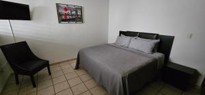 Postel nebo postele na pokoji v ubytování Suites Sta Tere