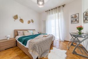 Postel nebo postele na pokoji v ubytování Antico Borgo