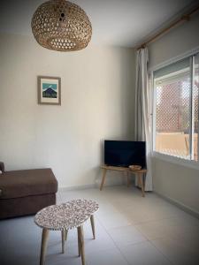 TV a/nebo společenská místnost v ubytování Aloe + 29 fotografií