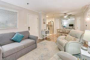 a living room with a couch and chairs and a kitchen at Wright by the Beach Hilton Head Condo with Perks in Hilton Head Island