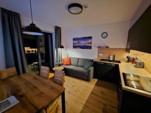 Kuchyňa alebo kuchynka v ubytovaní Benecko moderní apartmán A30 by AlkaTravel