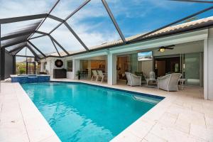 an image of a swimming pool in a house at 316 Marco in Marco Island