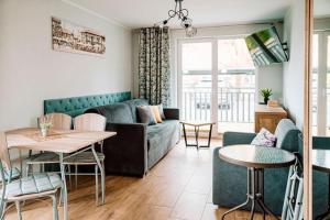 Posedenie v ubytovaní Apartamenty Majer Łeba