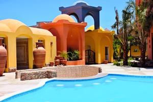 Бассейн в Amazing 2BR Apartment - Al Dora Resort, Hurghada или поблизости