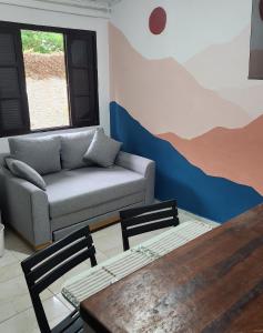 Uma área de estar em Pousada Pitaya Maresias