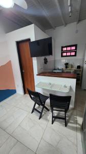 A cozinha ou cozinha compacta de Pousada Pitaya Maresias