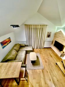 Χώρος καθιστικού στο Alpine Breza Apartments +10 φωτογραφίες