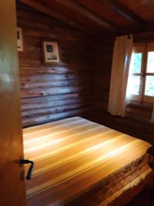 Postel nebo postele na pokoji v ubytování Cabañas Walwalün
