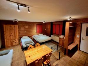 Letto o letti in una camera di Hôtel - Petit-déjeuner Le Trift