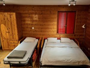 Letto o letti in una camera di Hôtel - Petit-déjeuner Le Trift