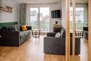 Posedenie v ubytovaní Apartamenty Majer Łeba