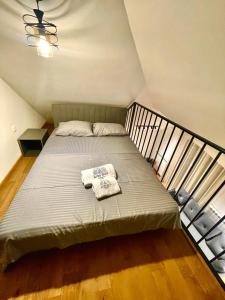 Ένα ή περισσότερα κρεβάτια σε δωμάτιο στο Alpine Breza Apartments