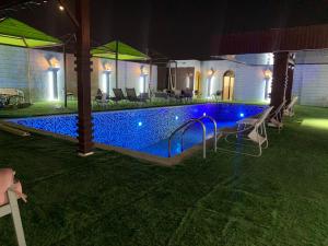 Bazén v ubytování sun rise hotel راس الخيمة nebo v jeho okolí