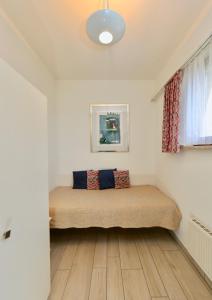 Ένα ή περισσότερα κρεβάτια σε δωμάτιο στο Ferienwohnung C15 +15 φωτογραφίες