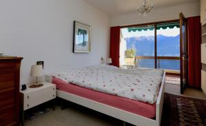 Postel nebo postele na pokoji v ubytování Ferienwohnung D22 + 19 fotografií