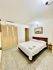 Postel nebo postele na pokoji v ubytování Hotel Casa Fátima