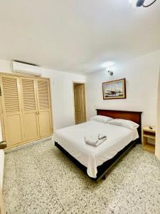 Postel nebo postele na pokoji v ubytování Hotel Casa Fátima