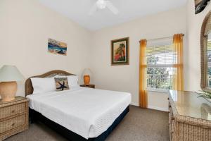 Giường trong phòng chung tại Spacious Paradise at Bahama Bay Resort +35 ảnh