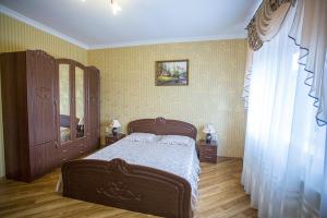 Postel nebo postele na pokoji v ubytování Goldenluxe