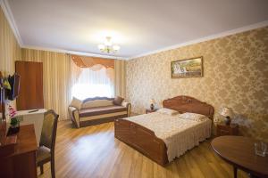 Postel nebo postele na pokoji v ubytování Goldenluxe