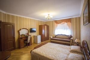 Postel nebo postele na pokoji v ubytování Goldenluxe