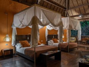 Postel nebo postele na pokoji v ubytování Refugio Amazonas Lodge