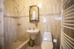 Koupelna v ubytování Goldenluxe