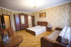 Postel nebo postele na pokoji v ubytování Goldenluxe