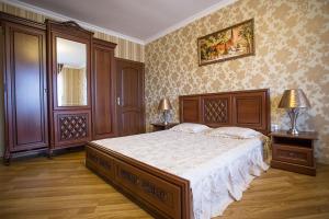 Postel nebo postele na pokoji v ubytování Goldenluxe