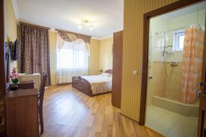 Koupelna v ubytování Goldenluxe