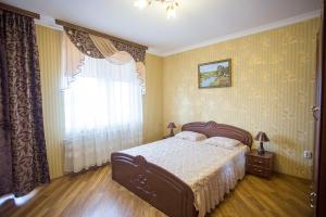 Postel nebo postele na pokoji v ubytování Goldenluxe