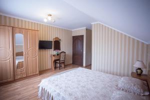 Postel nebo postele na pokoji v ubytování Goldenluxe
